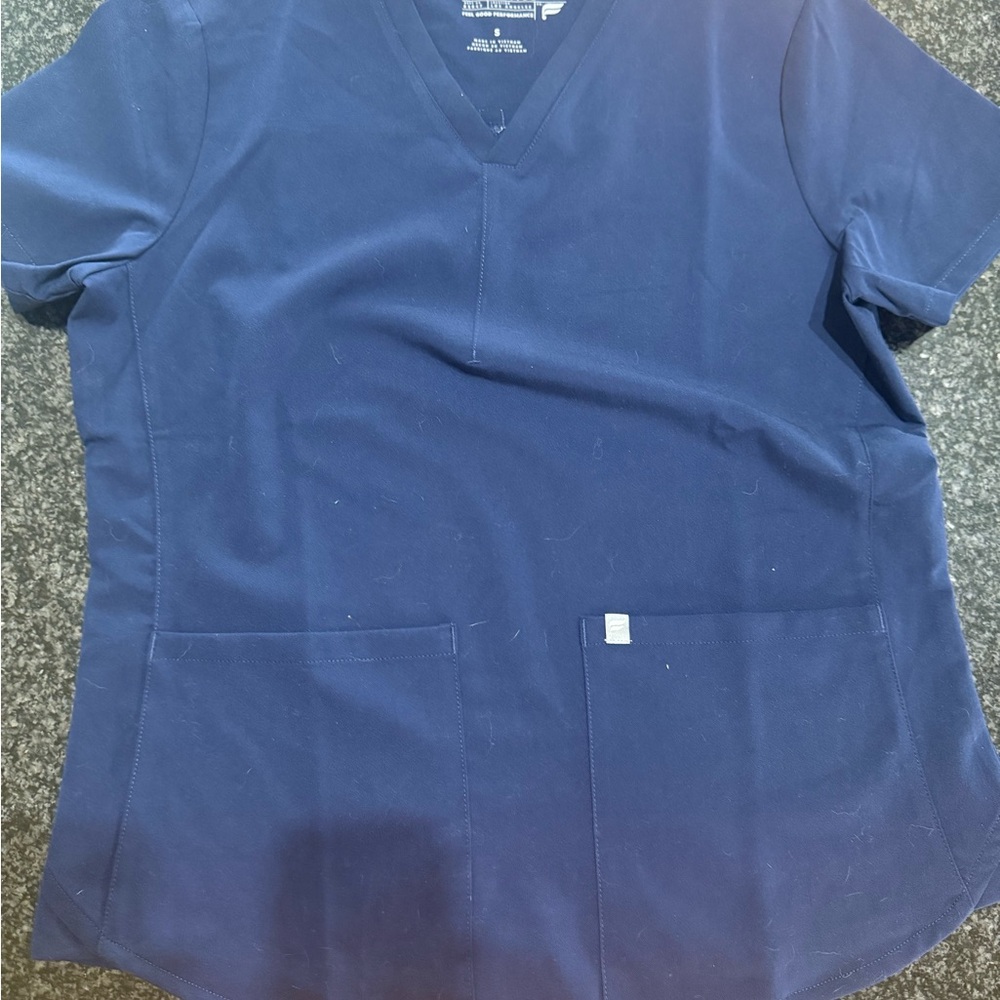 Fabletics scrubs blue V-Neck Top. Size small.   (See matching pants)